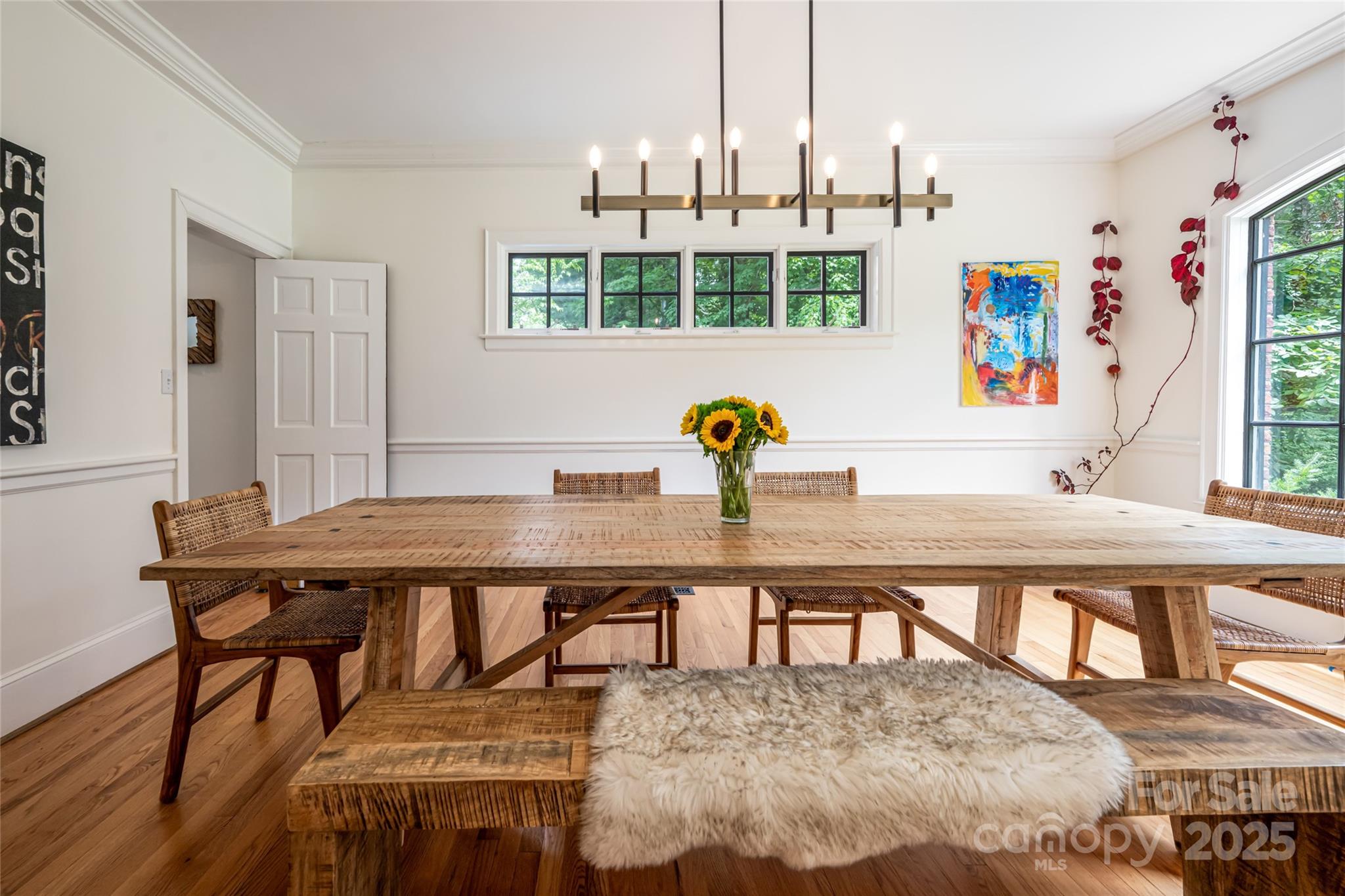 3 Lone Pine Road Biltmore Forest, NC 28803 - Photo 8 of 47 a view of a dining room with furniture and wooden floor