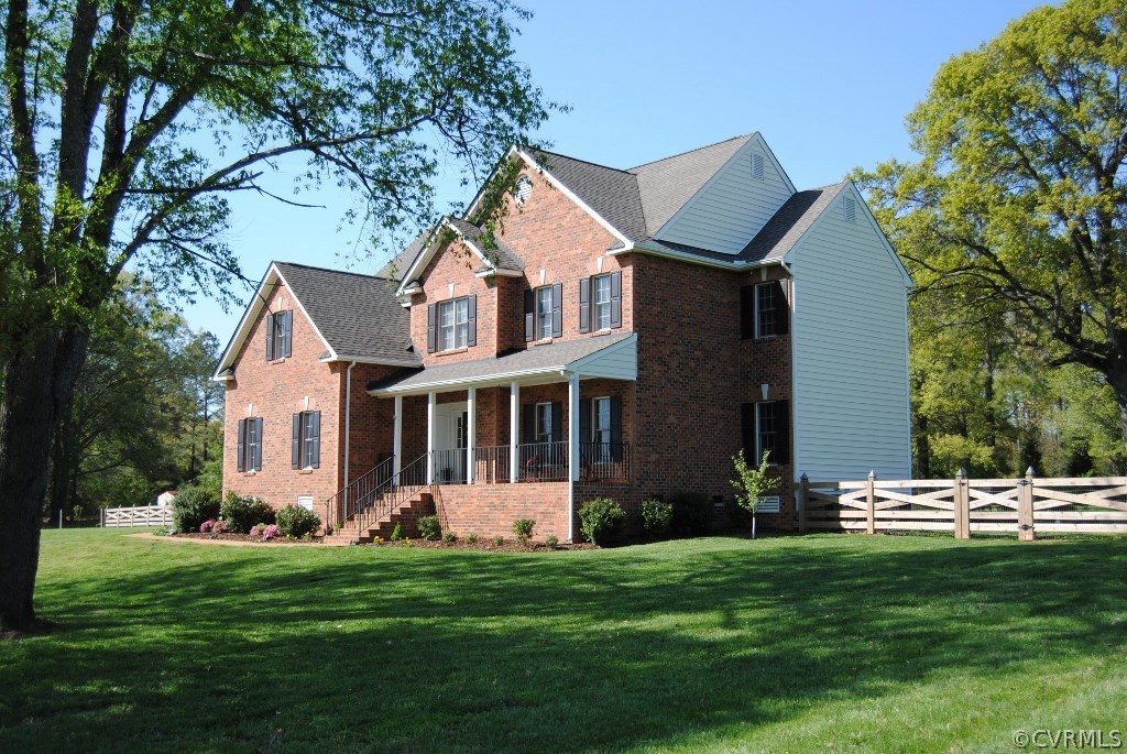 472 Three Chopt Road Manakin-Sabot, VA 23103 - Photo 1 of 23 a front view of a house with a garden and trees