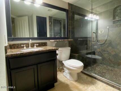 3235 East Camelback Road, Unit 104 Phoenix, AZ 85018 - Photo 11 of 17 a bathroom with a sink and a toilet