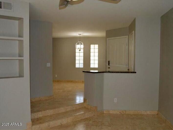 3235 East Camelback Road, Unit 104 Phoenix, AZ 85018 - Photo 5 of 17 a view of hallway with window