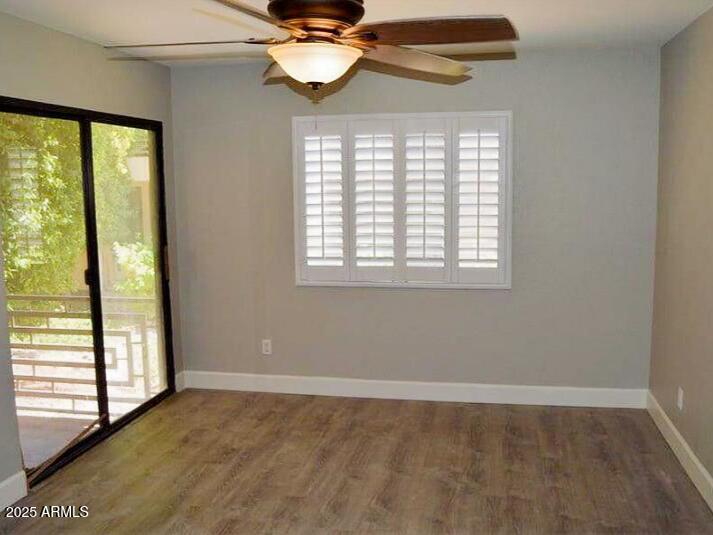 3235 East Camelback Road, Unit 104 Phoenix, AZ 85018 - Photo 8 of 17 a view of an empty room with a window