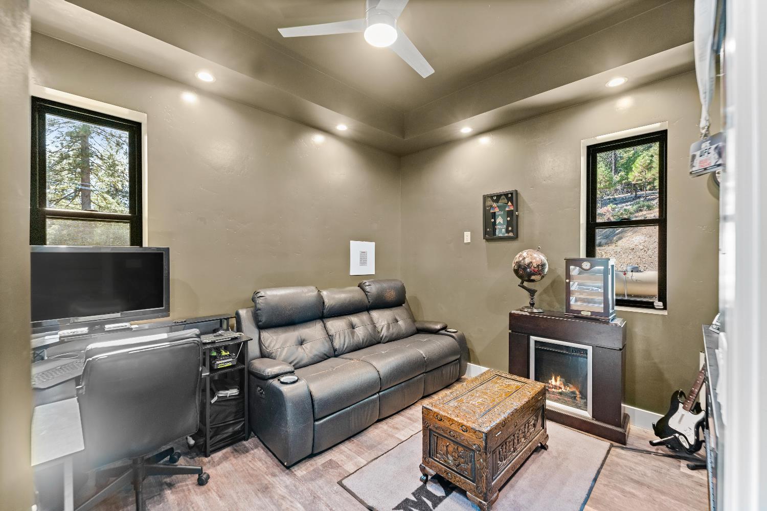 29115 Secret Town Road Colfax, CA 95713 - Photo 21 of 82 a livingroom with workspace and a couch