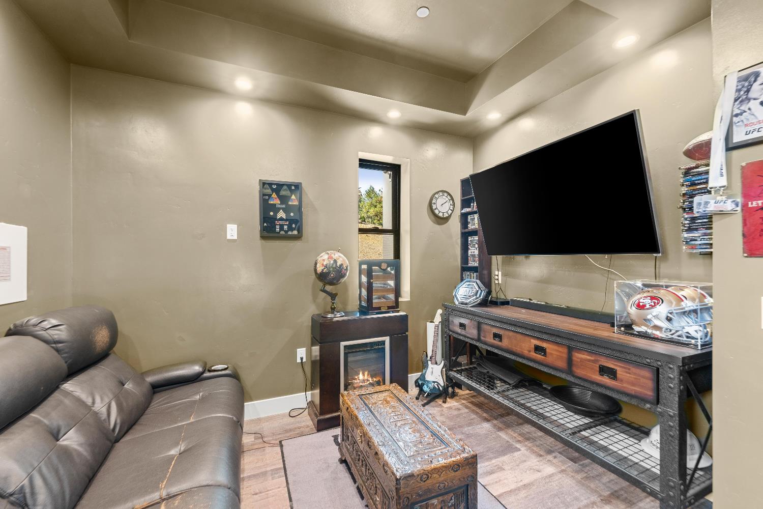 29115 Secret Town Road Colfax, CA 95713 - Photo 22 of 82 a living room with furniture and a flat screen tv