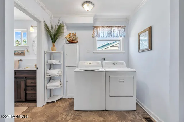 a bathroom with a sink a mirror and a shower