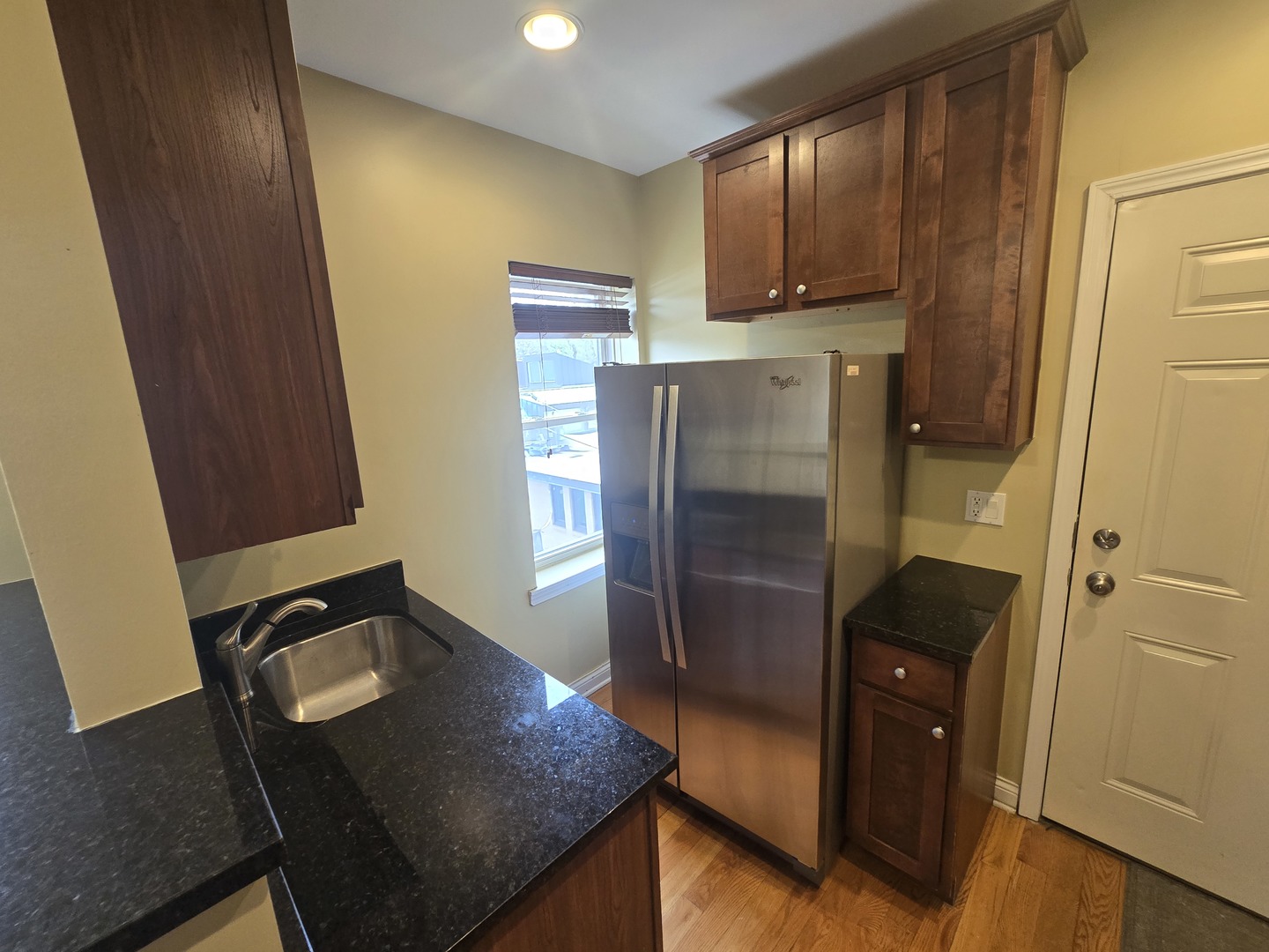 56 Forest Avenue, Unit 3N Riverside, IL 60546 - Photo 2 of 10 a view of kitchen with cabinets and refrigerator