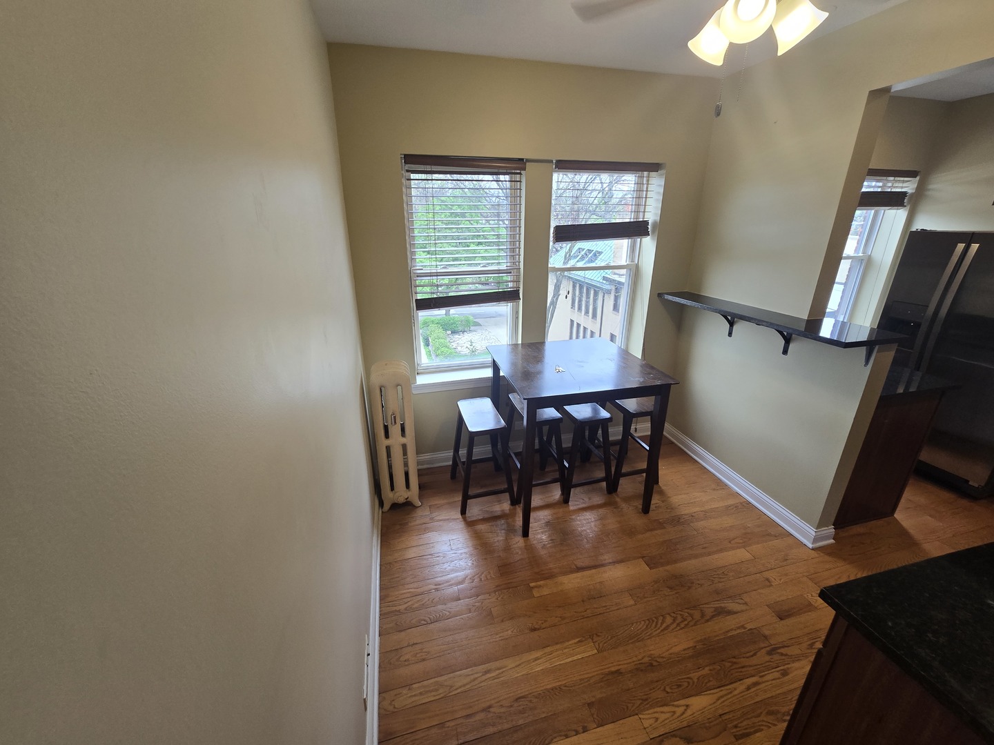 56 Forest Avenue, Unit 3N Riverside, IL 60546 - Photo 7 of 10 a view of a dining room with furniture and a chandelier