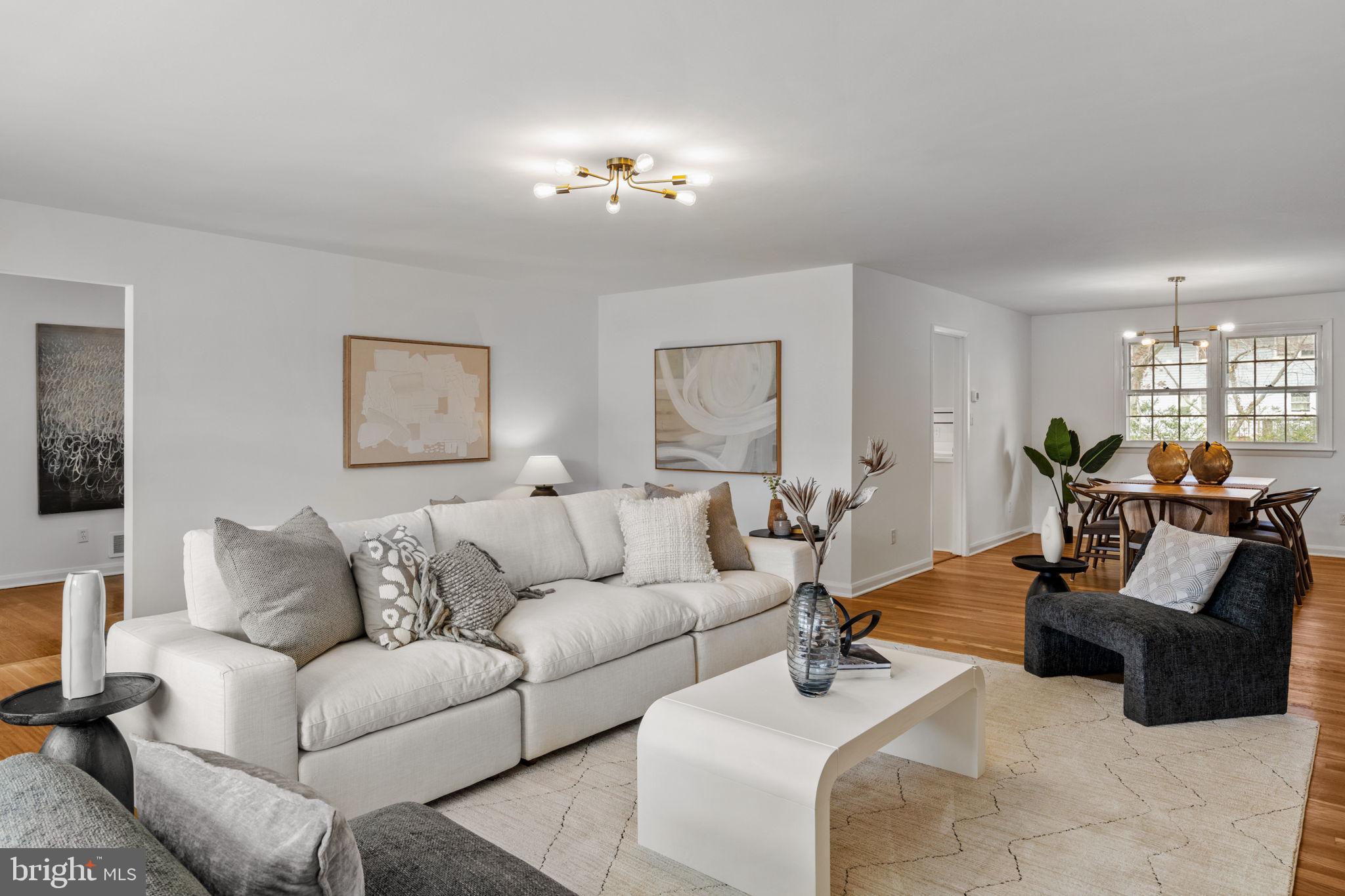 2529 Raven Road Wilmington, DE 19810 - Photo 2 of 80 a living room with furniture and a chandelier