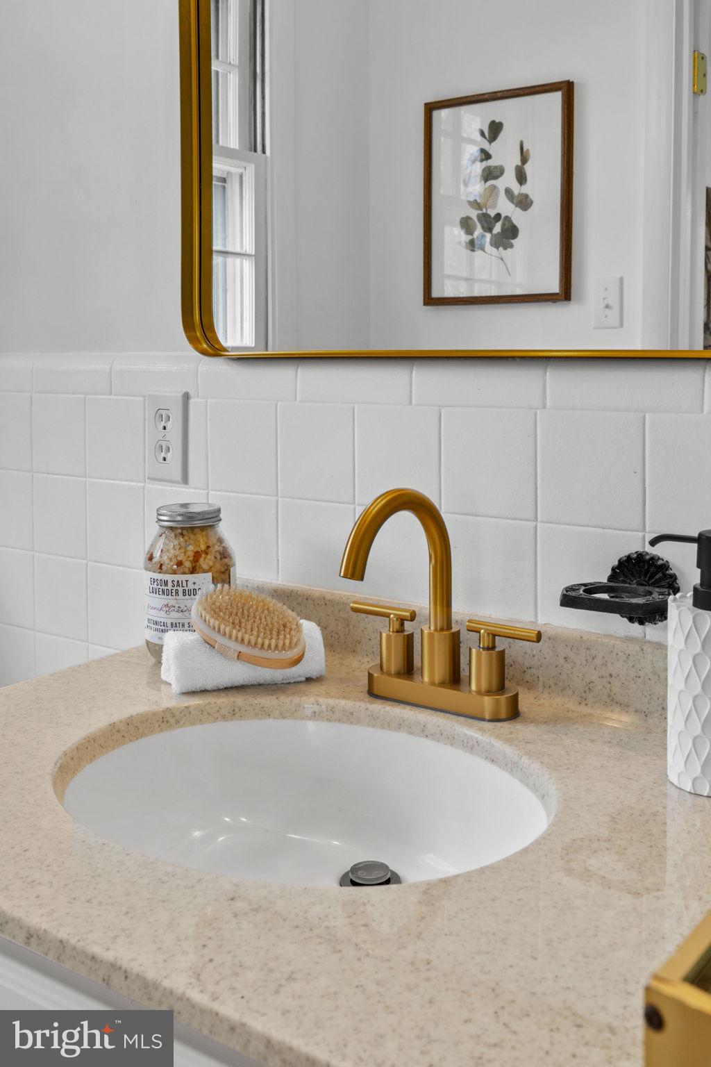 2529 Raven Road Wilmington, DE 19810 - Photo 24 of 80 a bathroom with a sink and a mirror