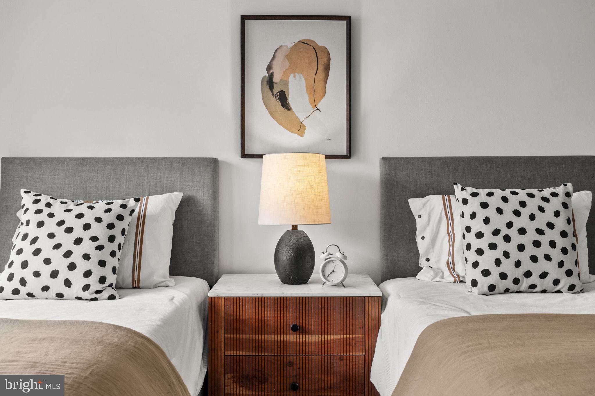 2529 Raven Road Wilmington, DE 19810 - Photo 30 of 80 a bedroom with a bed and a wall painting