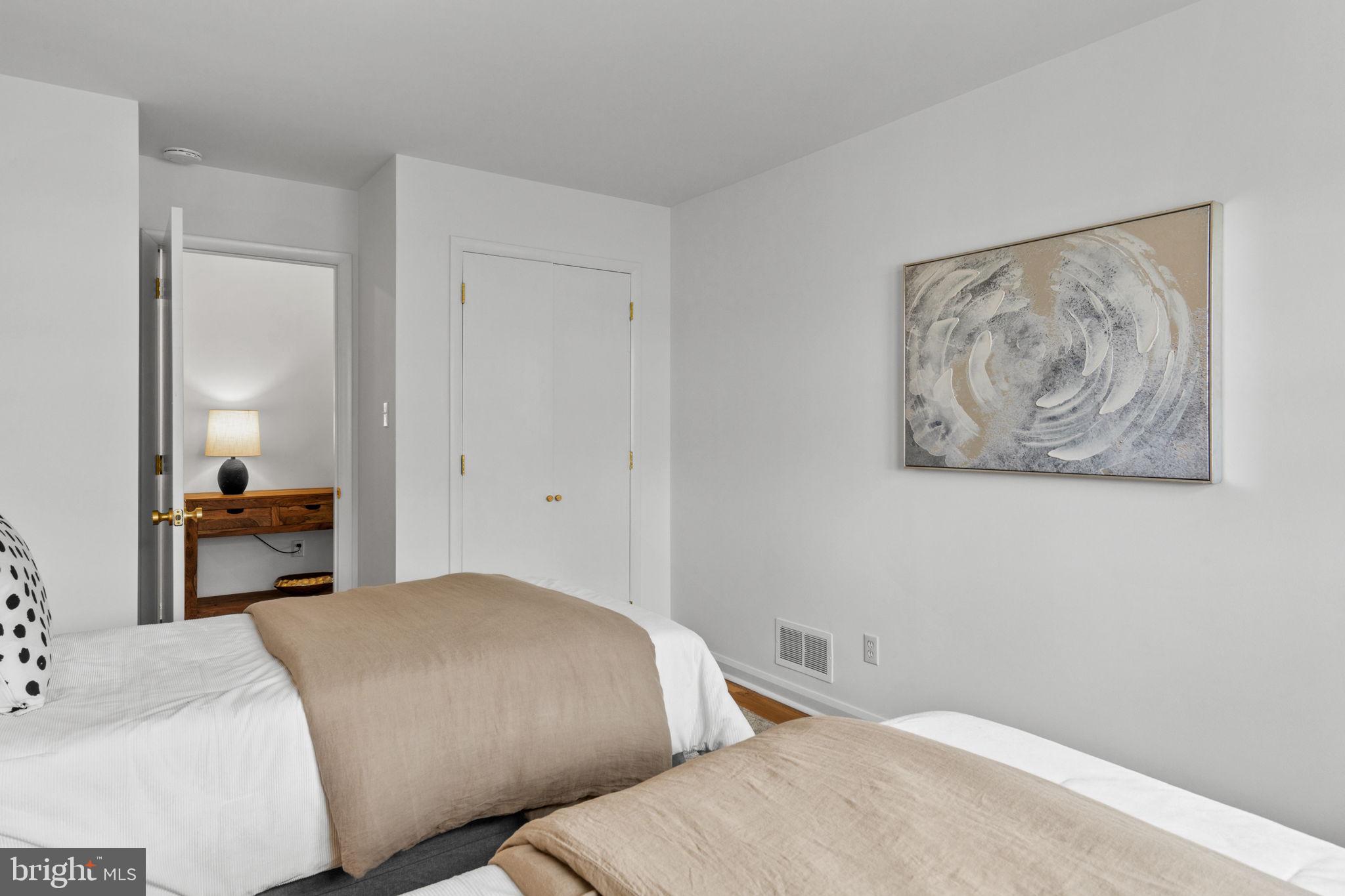 2529 Raven Road Wilmington, DE 19810 - Photo 31 of 80 a bedroom with a bed and the painting on the wall