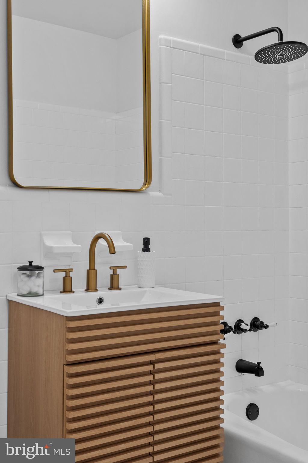 2529 Raven Road Wilmington, DE 19810 - Photo 34 of 80 a bathroom with a sink and a mirror