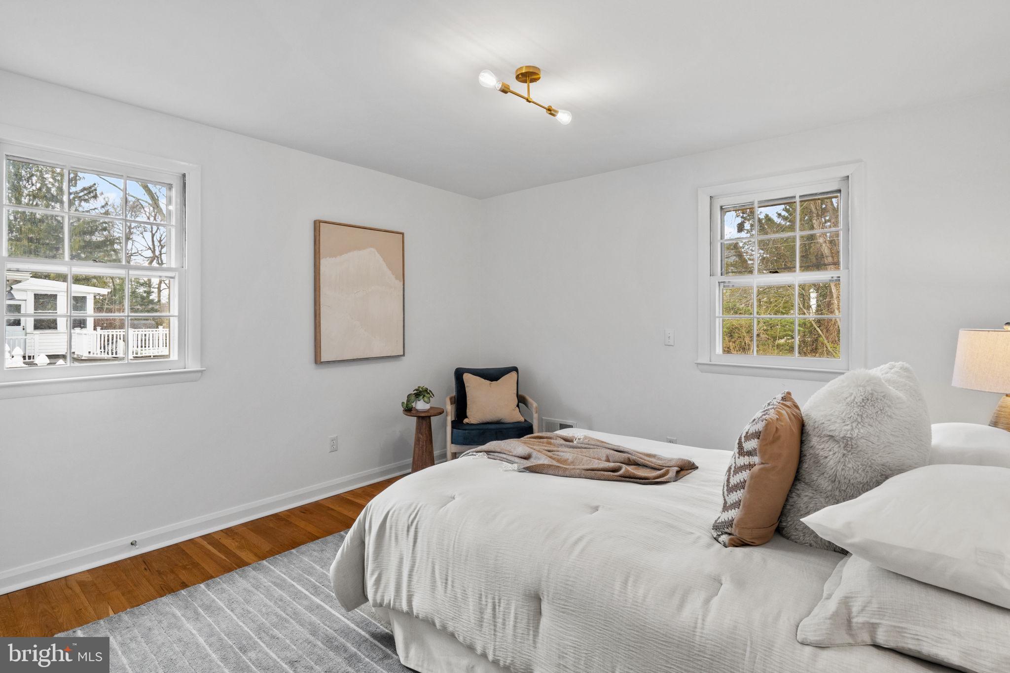 2529 Raven Road Wilmington, DE 19810 - Photo 35 of 80 a bedroom with a bed and wooden floor