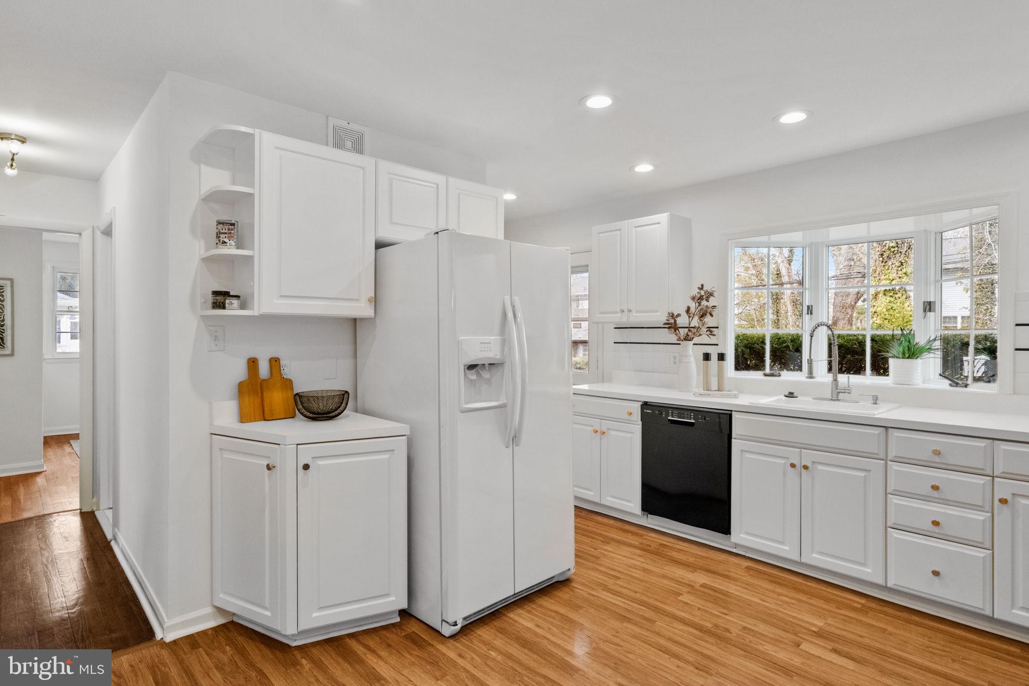 2529 Raven Road Wilmington, DE 19810 - Photo 41 of 80 a kitchen with white cabinets and white appliances