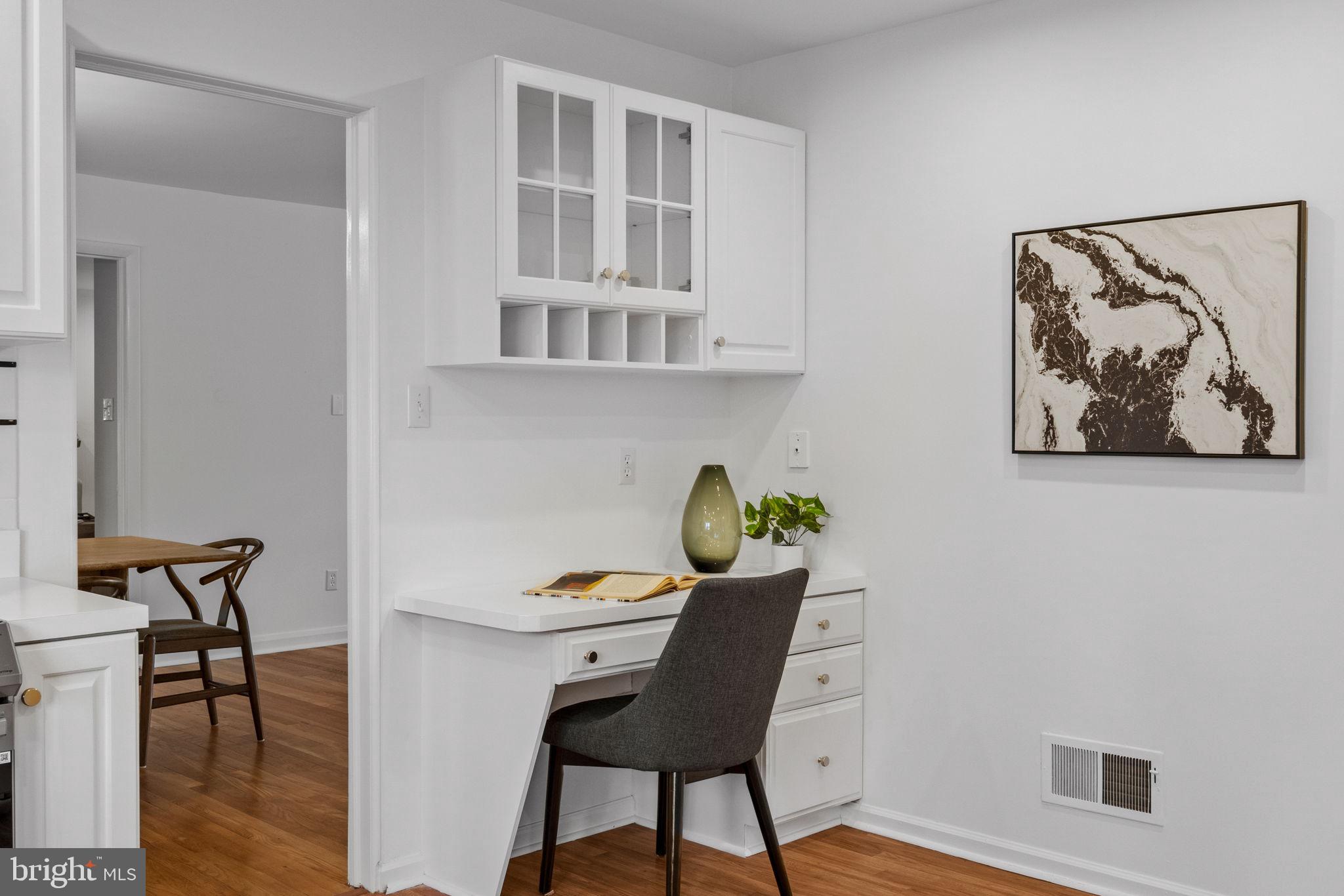 2529 Raven Road Wilmington, DE 19810 - Photo 47 of 80 a workspace with furniture and wooden floor