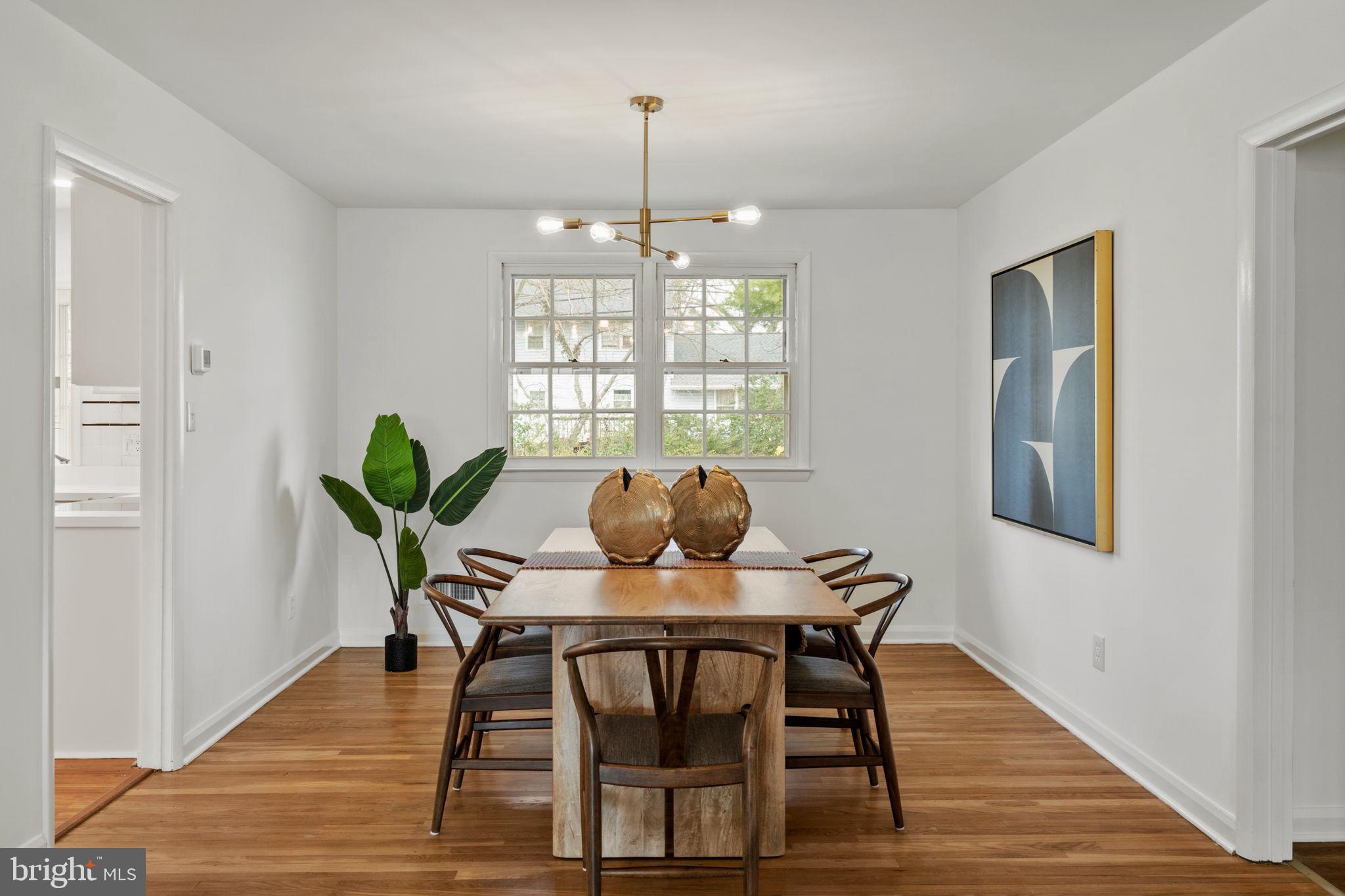 2529 Raven Road Wilmington, DE 19810 - Photo 48 of 80 a view of a dining room with furniture window and wooden floor