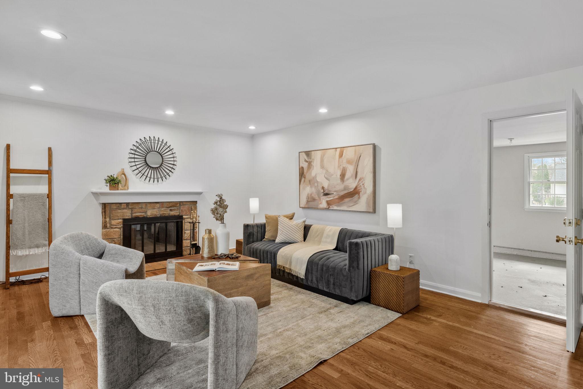 2529 Raven Road Wilmington, DE 19810 - Photo 60 of 80 a living room with furniture and a fireplace