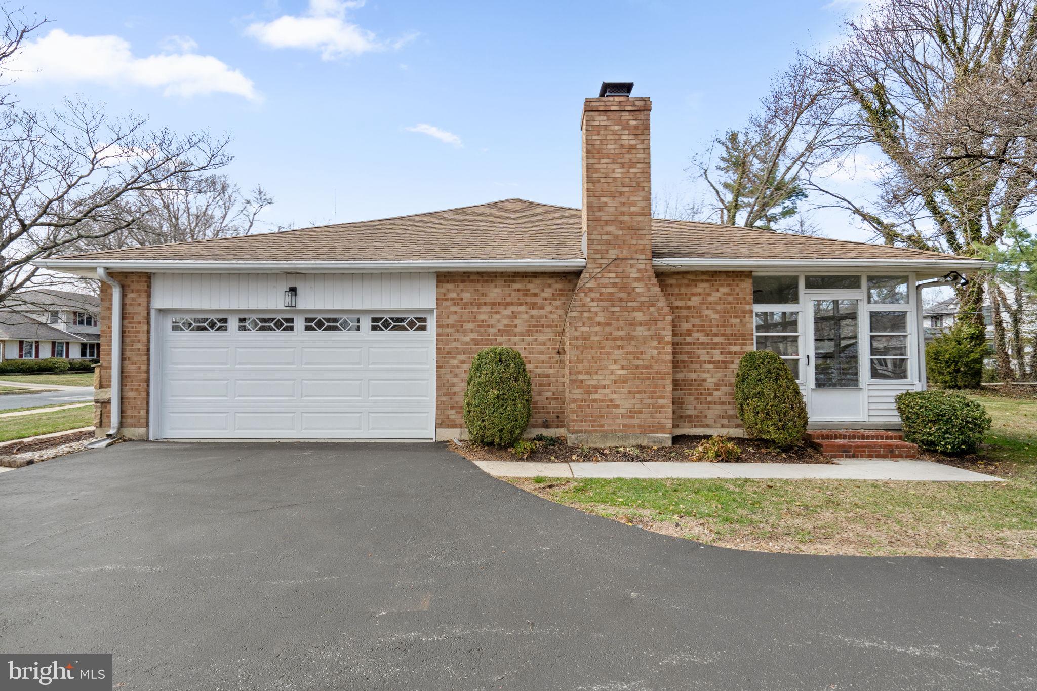2529 Raven Road Wilmington, DE 19810 - Photo 8 of 80 a view of a house with a yard and garage