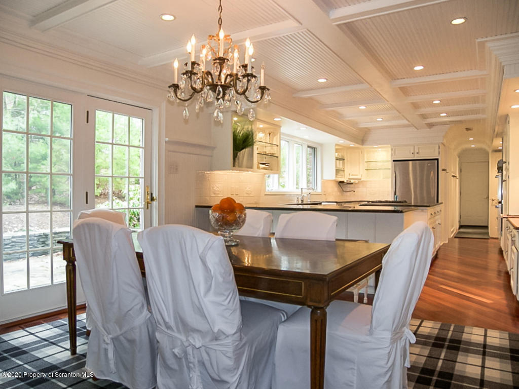715 Lantern Hill Road Shavertown, PA 18708 - Photo 11 of 38 a view of a dining room with furniture and a chandelier