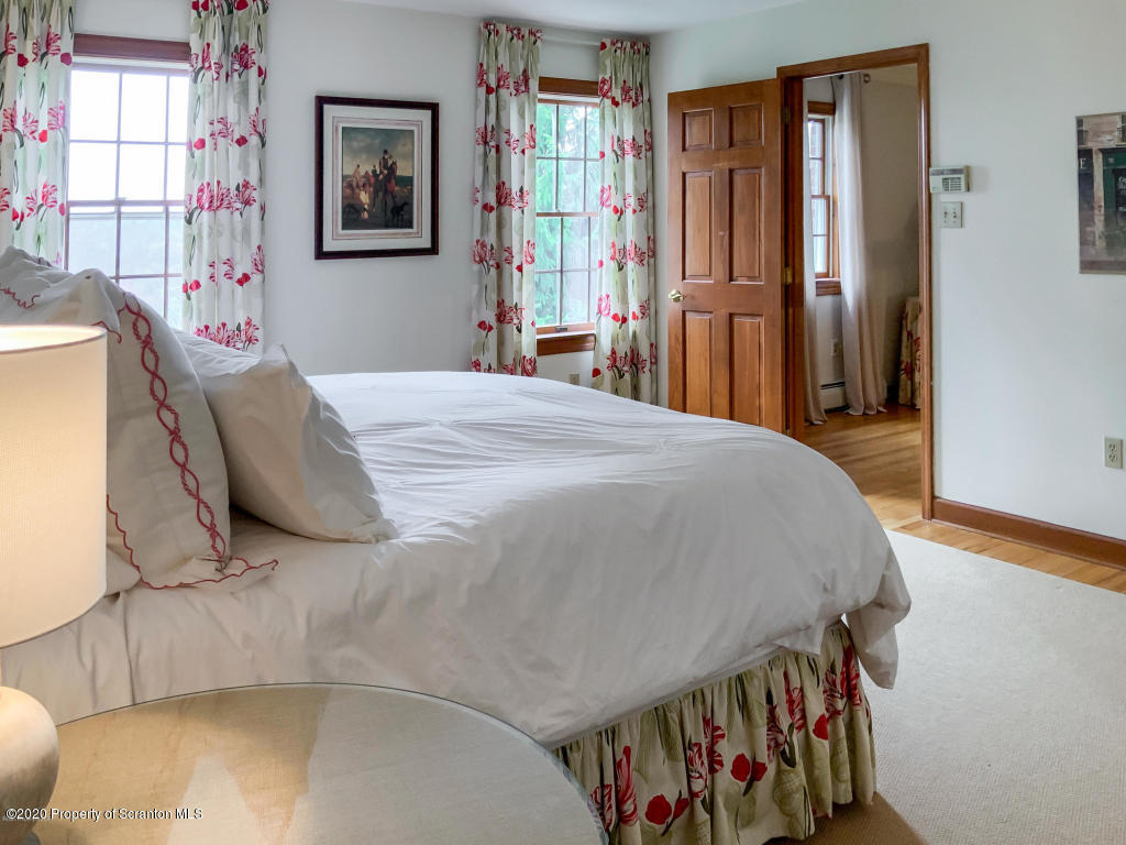 715 Lantern Hill Road Shavertown, PA 18708 - Photo 22 of 38 a bedroom with a bed and a dresser
