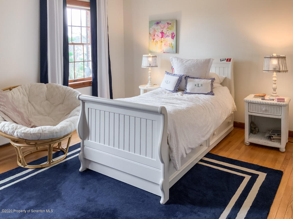 715 Lantern Hill Road Shavertown, PA 18708 - Photo 26 of 38 a bed sitting in a bedroom next to a window