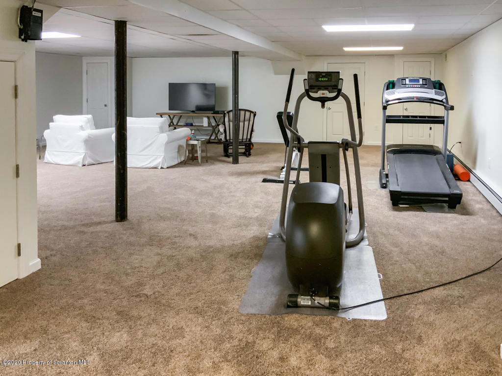 715 Lantern Hill Road Shavertown, PA 18708 - Photo 32 of 38 a view of a room with gym equipment