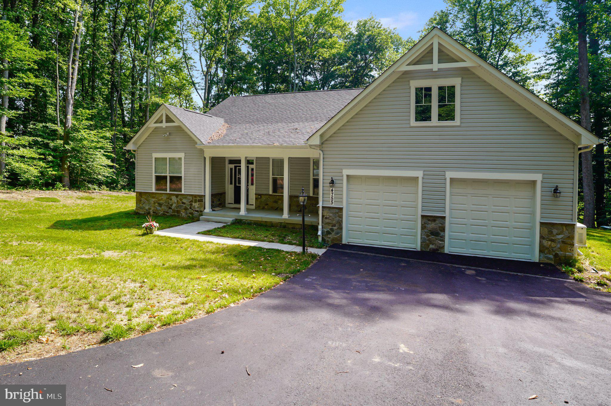 4755 South Polling House Road Harwood, MD 20776 - Photo 32 of 36 Charming home nestled in lush greenery.