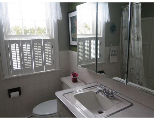 18 Mary Coburn Road Springfield, MA 01129 - Photo 14 of 25 a bathroom with a sink vanity mirror and a window