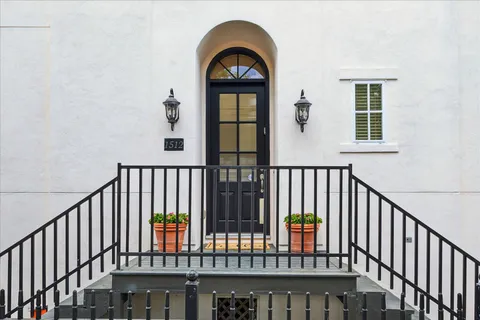 a view of a balcony with staircase