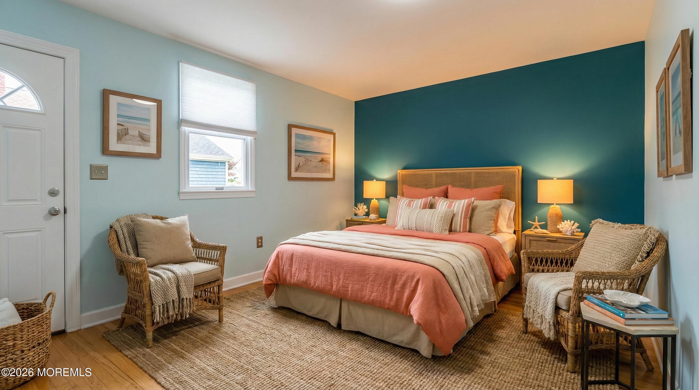 1407 Edgemere Road Wall, NJ 07719 - Photo 12 of 16 a bedroom with a bed and chair