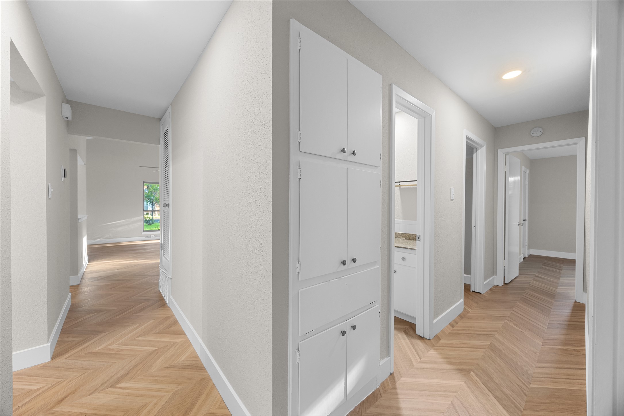 11714 Buckingham Road Austin, TX 78759 - Photo 16 of 34 a view of hallway with wooden floor