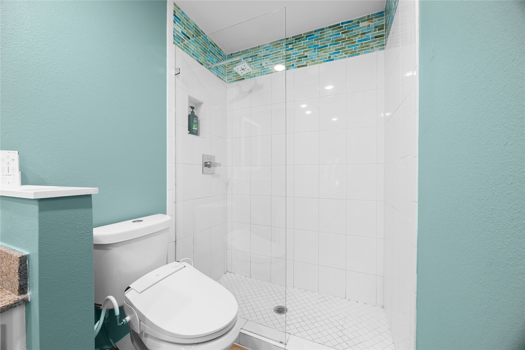 11714 Buckingham Road Austin, TX 78759 - Photo 20 of 34 a white toilet sitting next to a shower