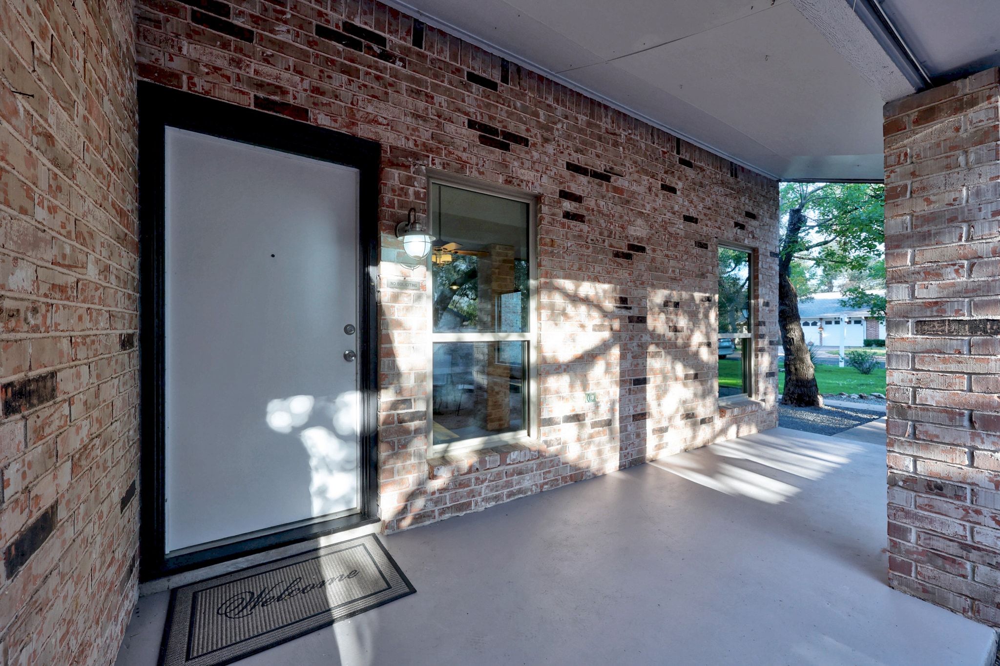 11714 Buckingham Road Austin, TX 78759 - Photo 2 of 34 a view of a porch with seating space