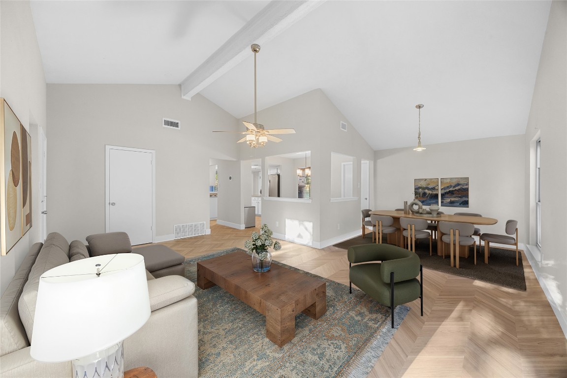 11714 Buckingham Road Austin, TX 78759 - Photo 4 of 35 Living room off the entry with plenty of natural light, LVP flooring on herringbone pattern and vaulted ceiling.