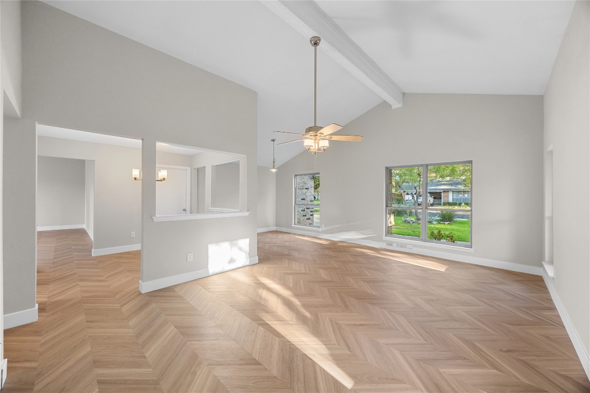 11714 Buckingham Road Austin, TX 78759 - Photo 7 of 35 Living and/or dining space off the entry with high vaulted ceiling, beamed ceiling, and ceiling fan.