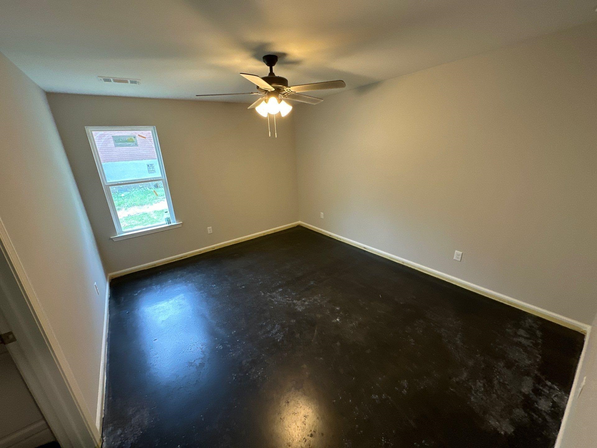 307 Harrell Street Memphis, TN 38112 - Photo 4 of 8 wooden floor in an empty room with a window