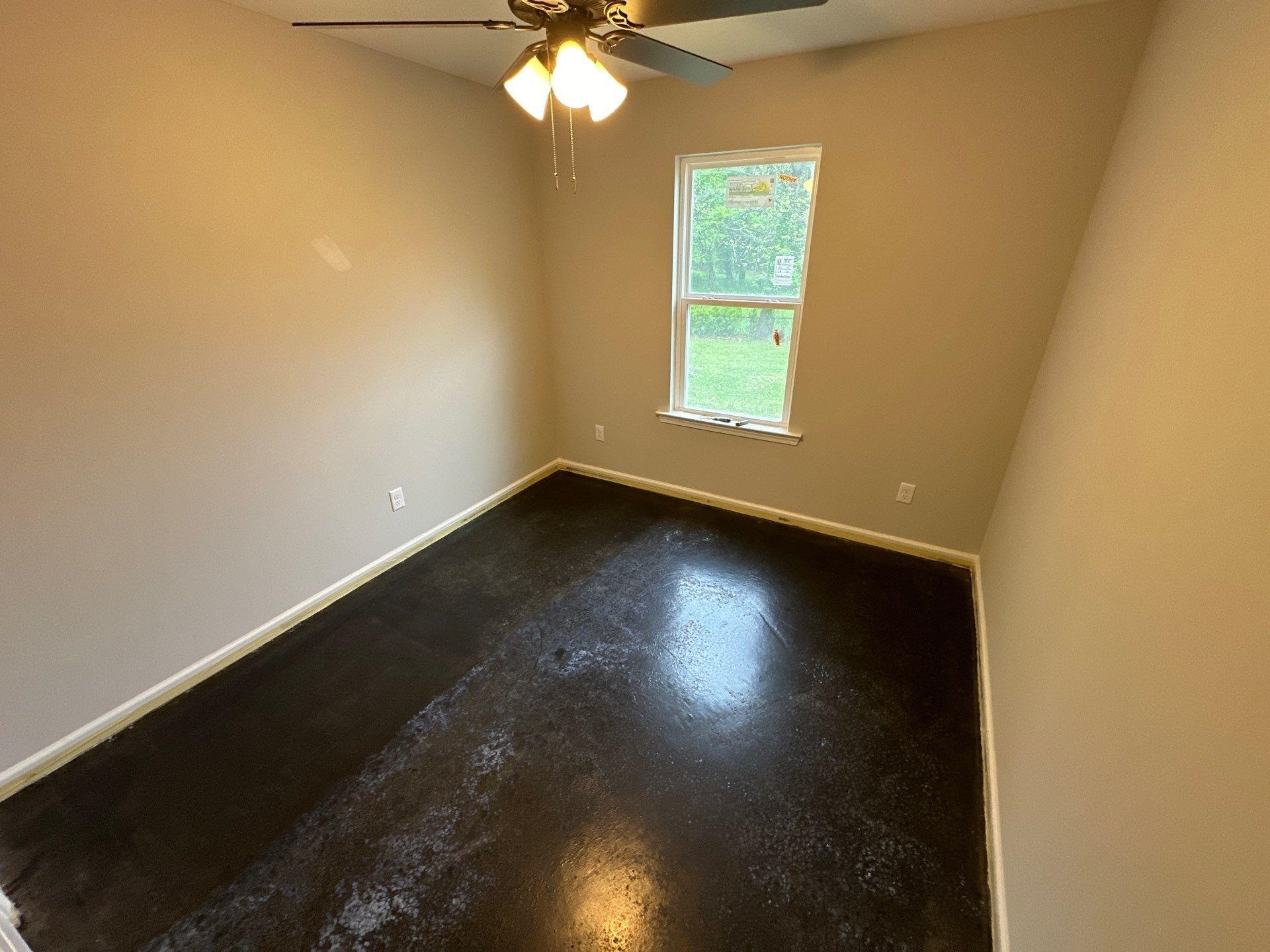 307 Harrell Street Memphis, TN 38112 - Photo 5 of 8 wooden floor in an empty room with a window