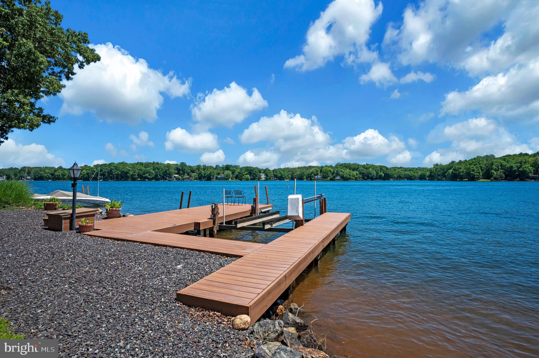 102 Flat Run Locust Grove, VA 22508 - Photo 6 of 60 Composite decking on dock with electric boat lift