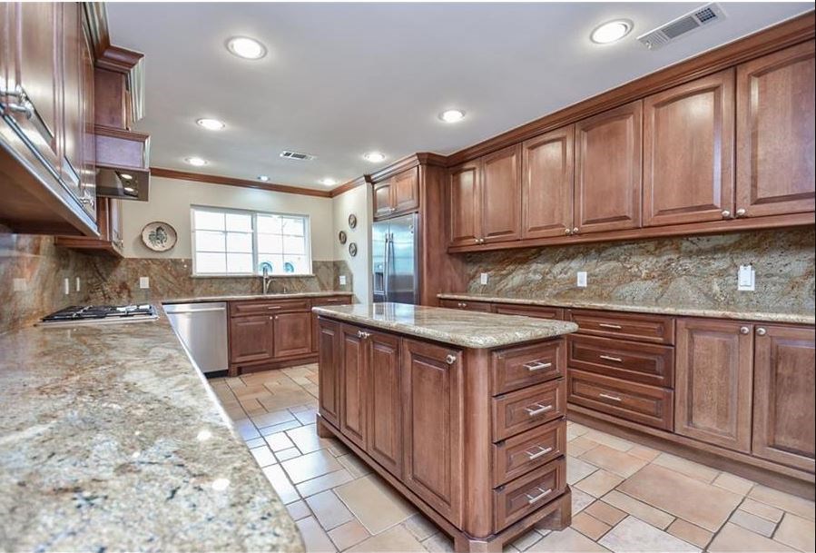 13123 Conifer Road Houston, TX 77079 - Photo 11 of 31 Stainless steel appliances, gas range, microwave, double oven and built in refrigerator.