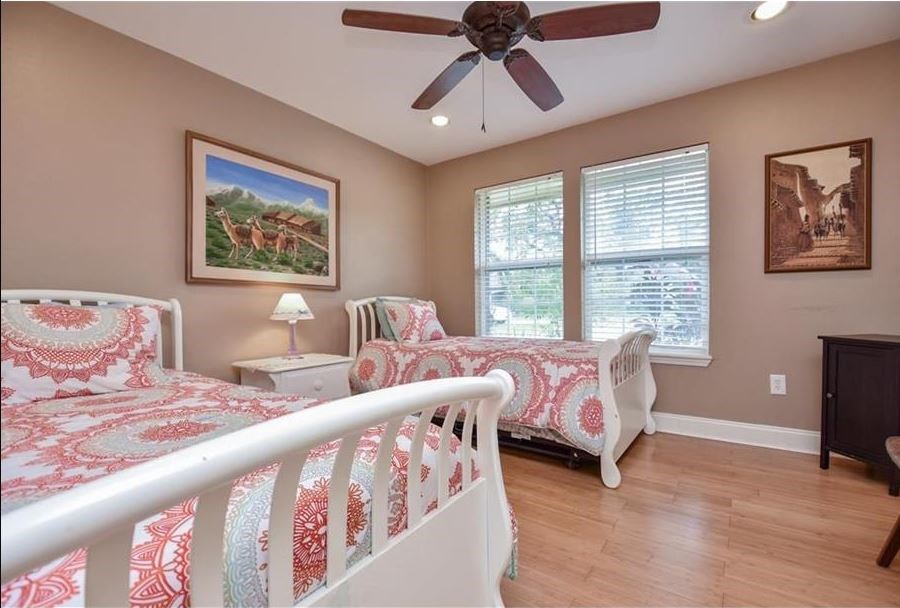 13123 Conifer Road Houston, TX 77079 - Photo 12 of 31 Secondary Bedroom on front of the house has ceiling fan, bamboo flooring and large closet.