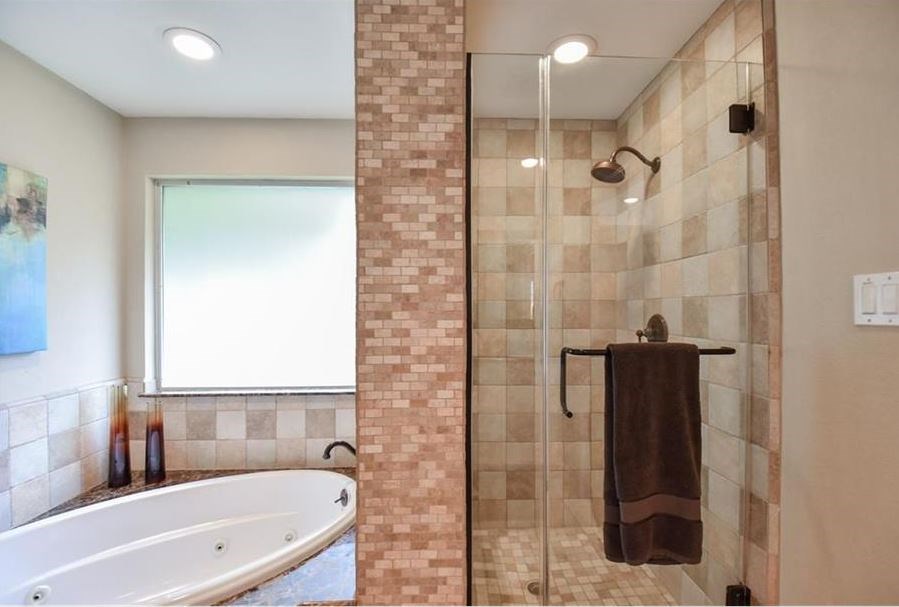 13123 Conifer Road Houston, TX 77079 - Photo 21 of 31 View of the updated bathtub and shower.