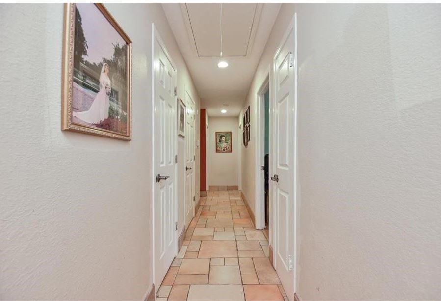 13123 Conifer Road Houston, TX 77079 - Photo 22 of 31 Hallway walking out of Master Bedroom.
