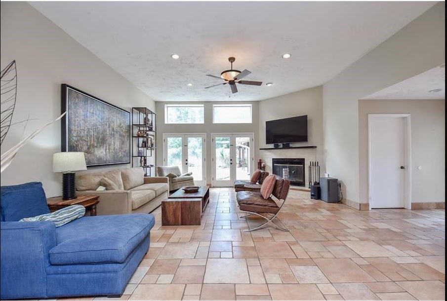 13123 Conifer Road Houston, TX 77079 - Photo 6 of 31 Living Room has lots of natural light and fireplace.