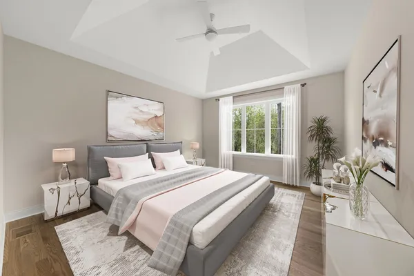 a bedroom with a large bed and a large window