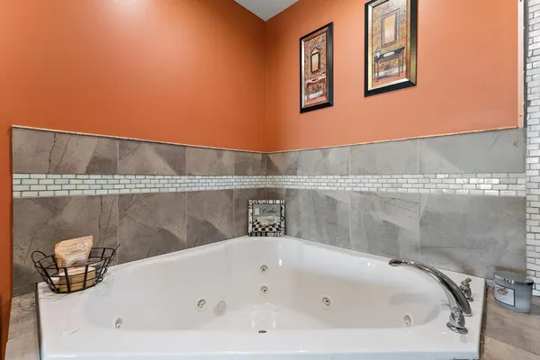 a bathroom with a bathtub