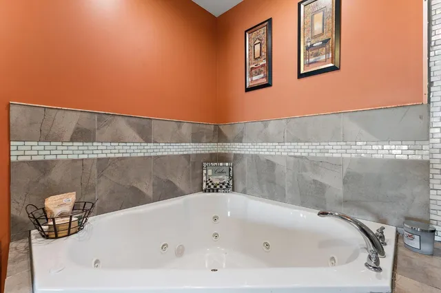 a bathroom with a bathtub