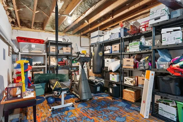 a view of house with deck outdoor seating and entertaining space