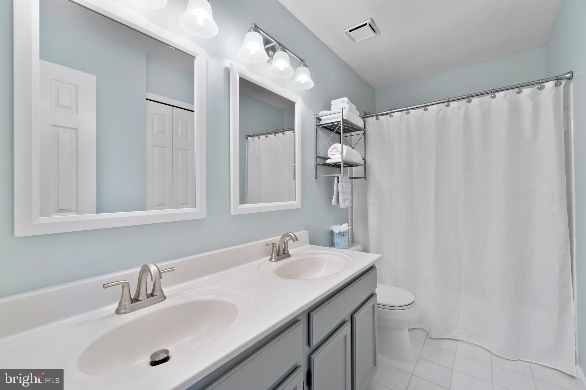 47572 Comer Square Sterling, VA 20165 - Photo 21 of 40 Recently updated hall bath w/dual sink vanity
