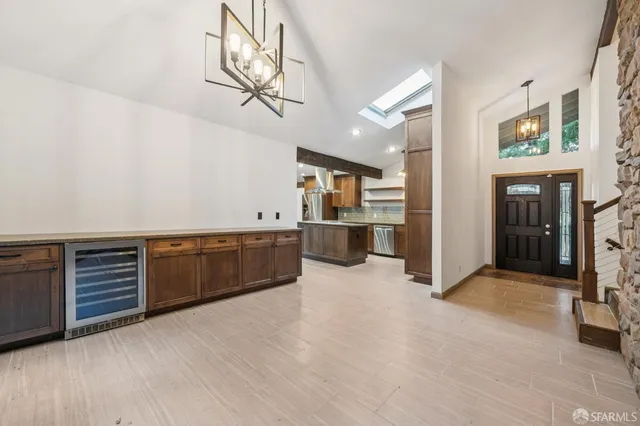 a view of a hallway with closet and entryway