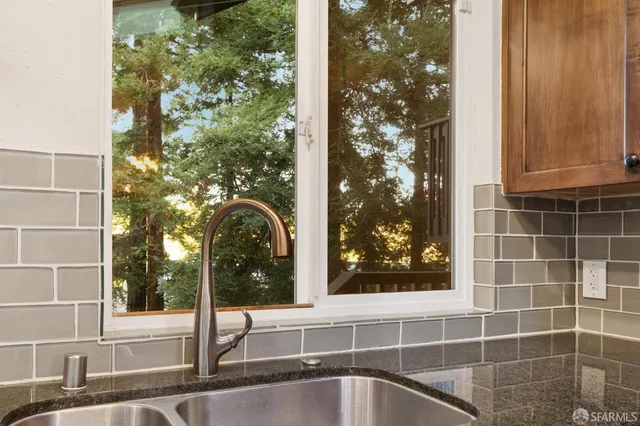 a house view with a backyard space