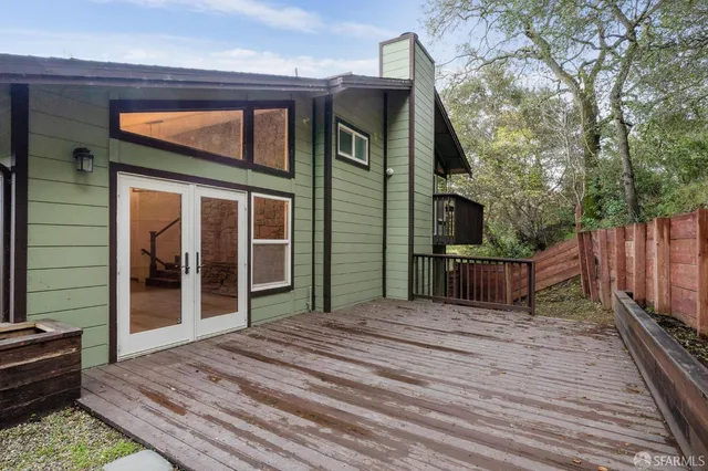 a view of a chandelier fan and a rug